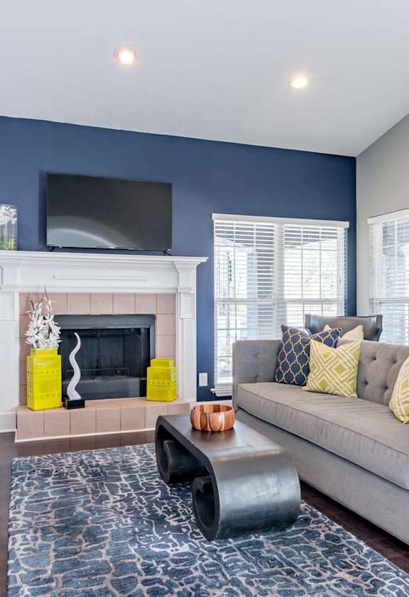 a living room with a couch and a table