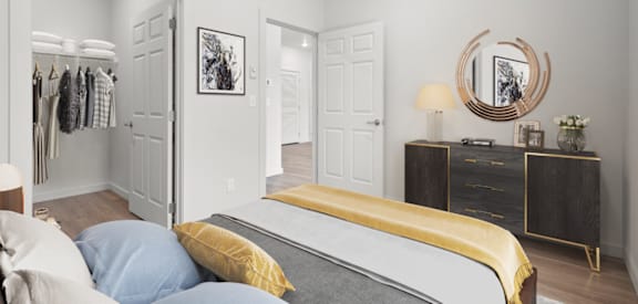 a bedroom with a bed and a closet