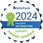 A badge indicating a property award winner for resident satisfaction in 2024.
