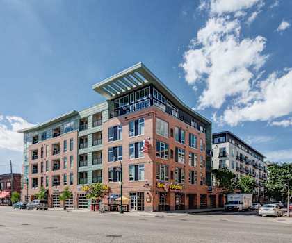 The exterior street view of Blue and Lime Apartments. 