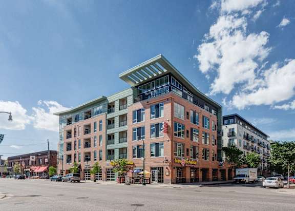 a large brick building on a city street