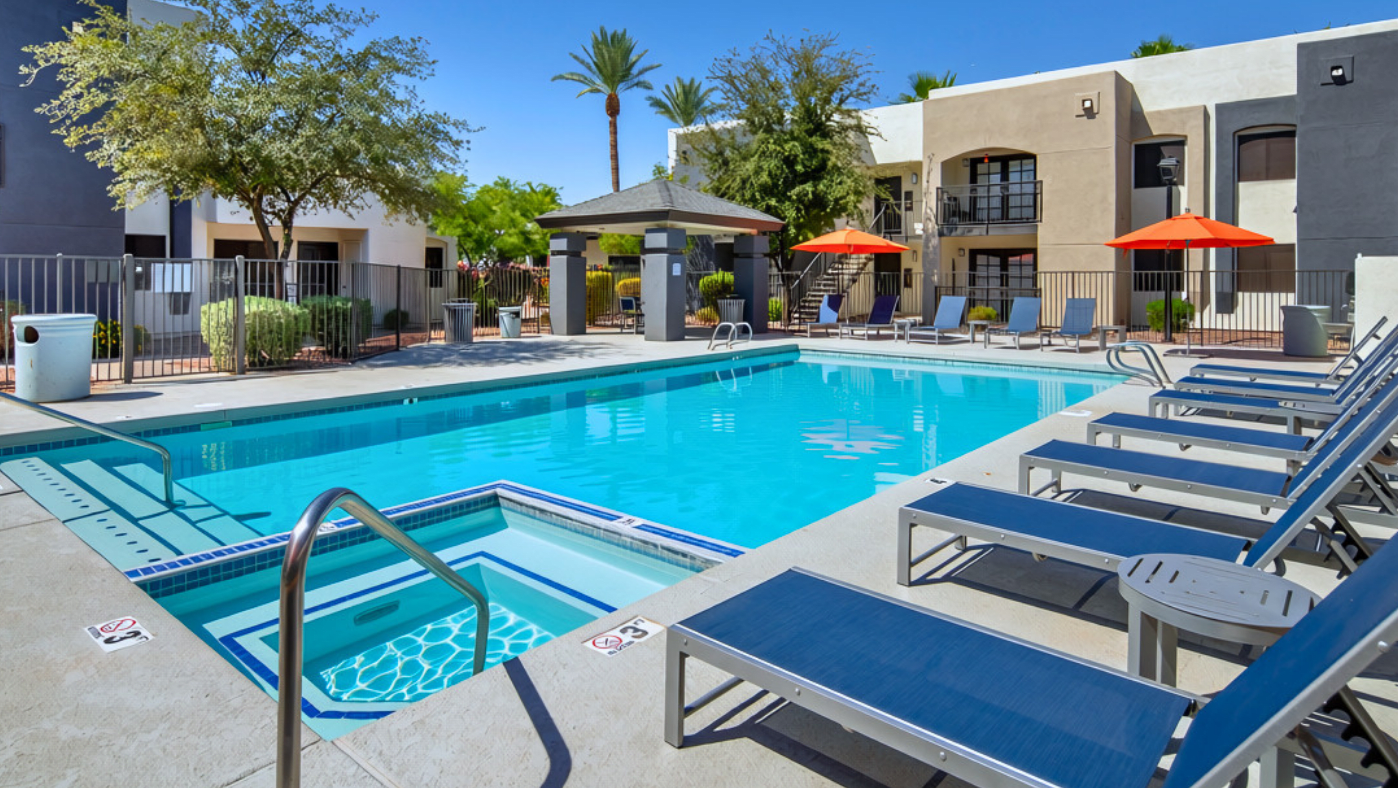Pool and poolside area at The Naya Apartments.