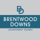 a blue and black sign with the downs logo