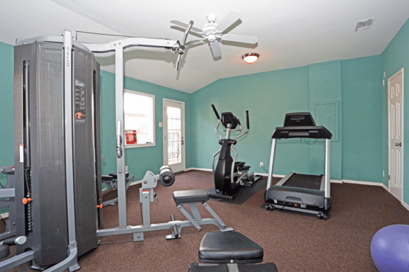 Fitness center with treadmill, weight