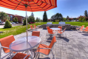 outdoor dining area by a grilling station
