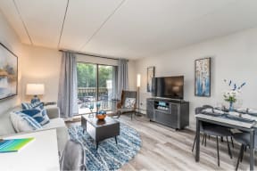 our apartments offer a living room with a fireplace and a dining table