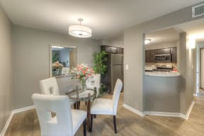 dining area next to a kitchen at a Carol Stream Crossing apartment