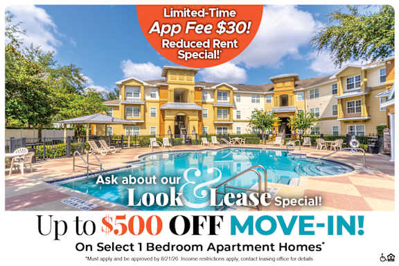 A large, luxurious apartment complex with a pool advertises a special lease offer.