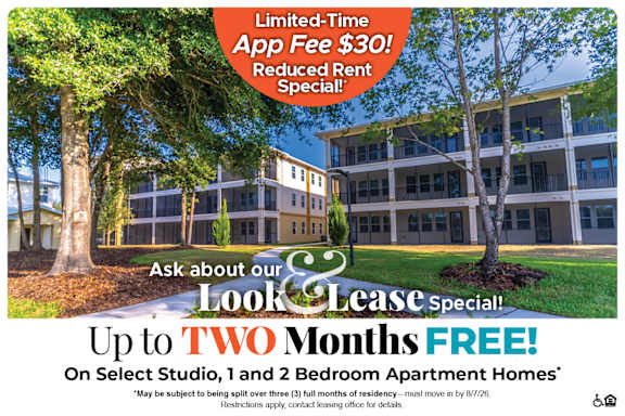 A house with a sign offering up to $300 off move-in costs for select 3 bedroom apartment homes.