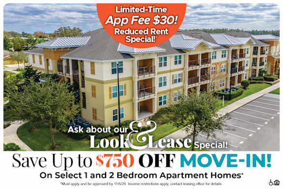An apartment complex advertises a limited-time app fee reduction and a move-in special.