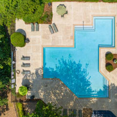 arial view of a pool in a backyard