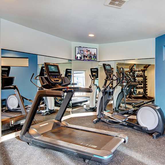 the gym with cardio equipment at our apartments
