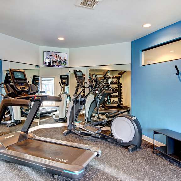 the gym with cardio equipment at our apartments
