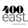 the logo for 100 oasis apartments with the word oasis on a green background