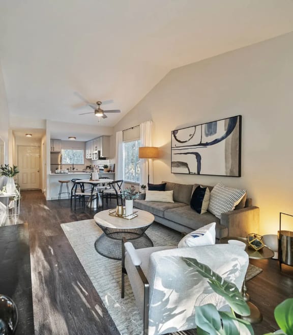 a living room with a couch and a table