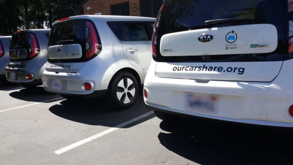 Mutual Housing electric vehicles in parking spaces