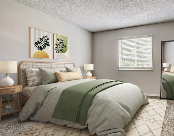 Guest bedroom with soft lighting and cozy layout in Aurora CO rental apartment.