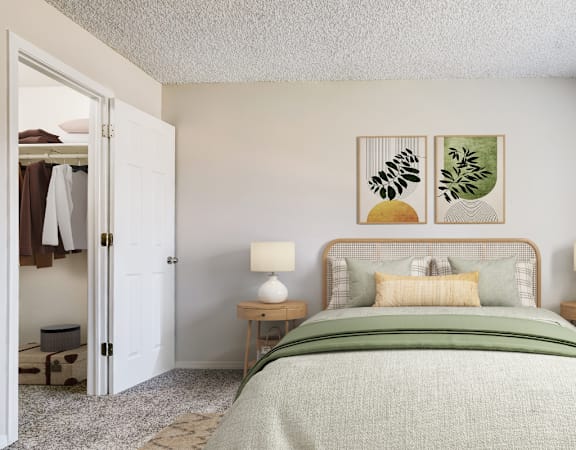 Tranquil bedroom with light green bedding and natural light at Aurora Meadows.