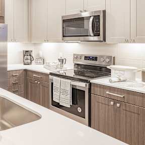 Kitchen with cabinets at The Glover House Apartments, District of Columbia