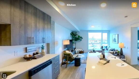 the kitchen and living room of an apartment