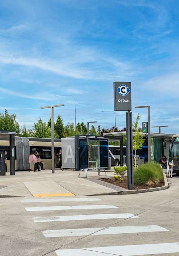 A bus station with a bus at Vancouver Mall Apartments, Washington