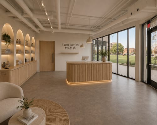 A reception area with a sign that says