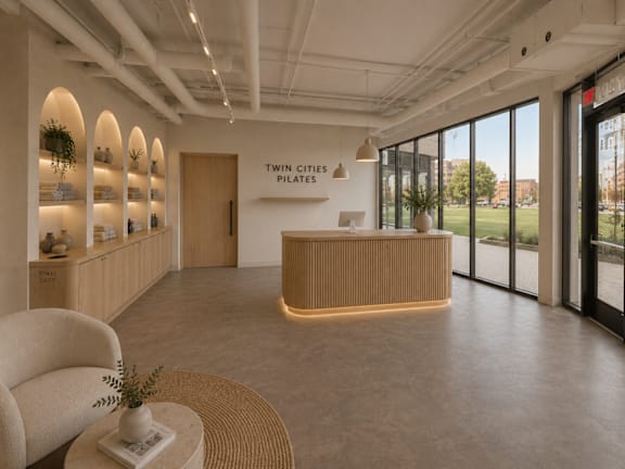 A reception area with a sign that says