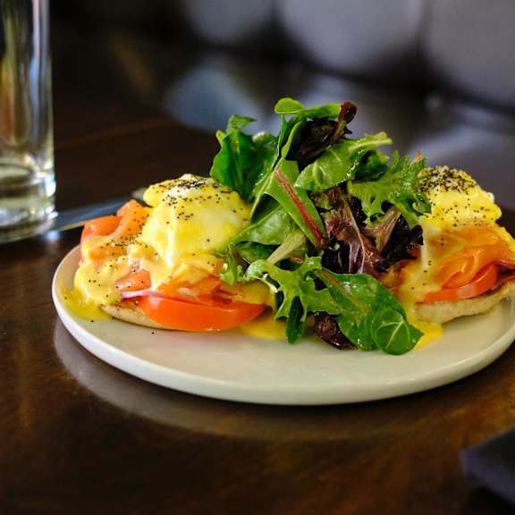 A plate of Eggs Benedict with salmon at Bautista Apartments, Arizona, 85745
