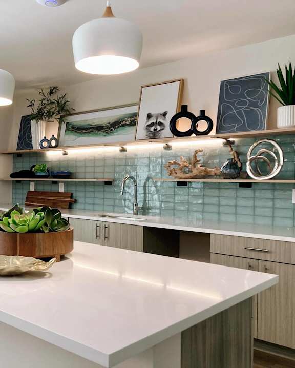 Modern lounge with sink and backsplash at NOVI