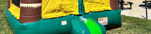A large inflatable slide with a slide, slide, and slide.
