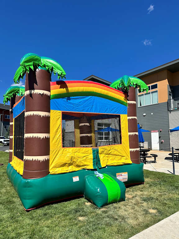 A large inflatable slide with a slide, slide, and slide.
