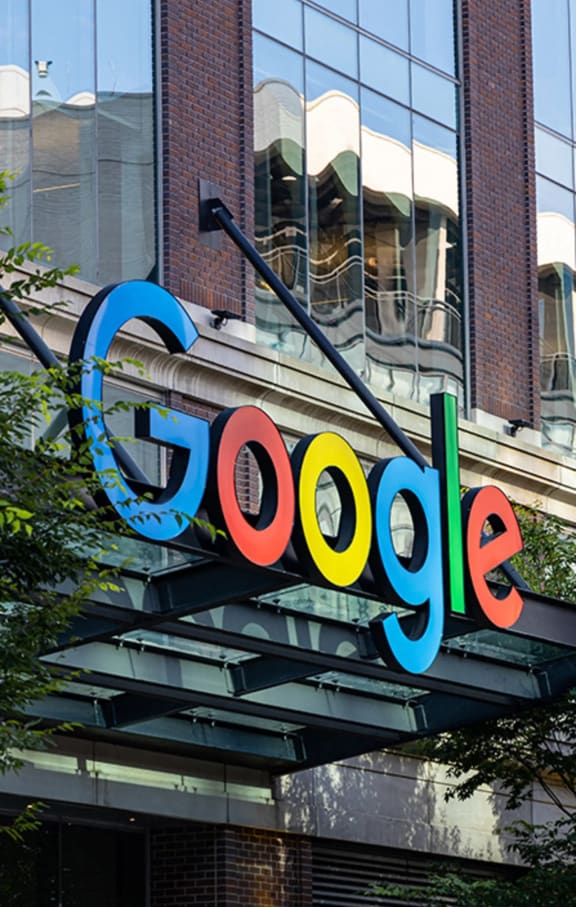 a sign for google outside of a google building
