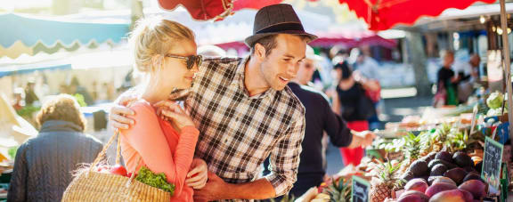 a couple shopping at a farmers market at Vendome Place, San Jose, CA
