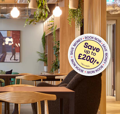 A cafe interior with a sign offering a discount.