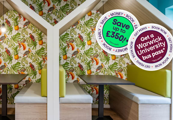 A room with a bed and a table with a sign that says Save up to £3.50.