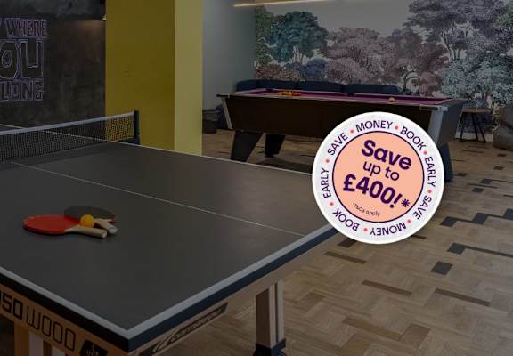 A ping pong table with a sign that says "Save up to £400".