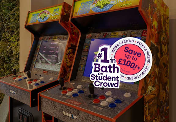 A claw machine is advertising a free bath for the first 100 students.