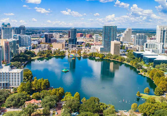 an aerial view of the lake and the city