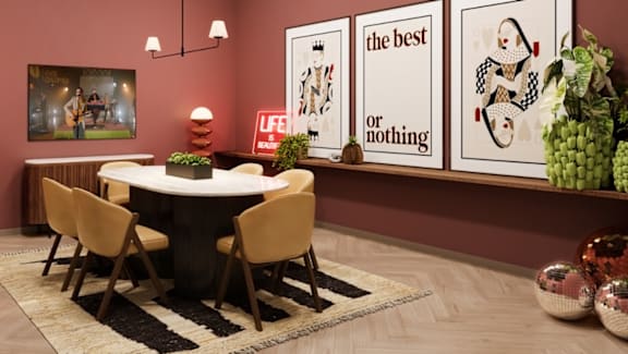 A dining room with a round table and chairs.
