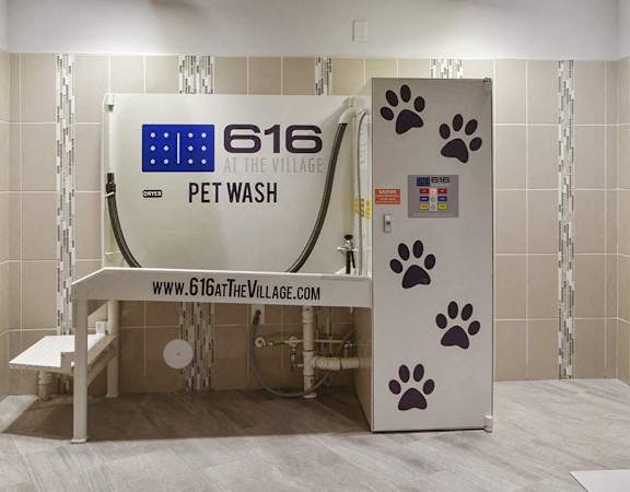a large machine in a room with a shower