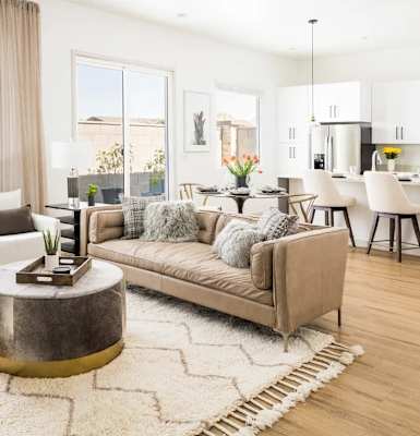 A modern living room with a large window and a view of the city. at Onyx at Westgate Apartments, Glendale, AZ, 85305