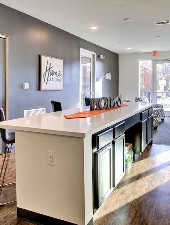 leasing office space with couches and tables at Union at Crescent, Bloomington