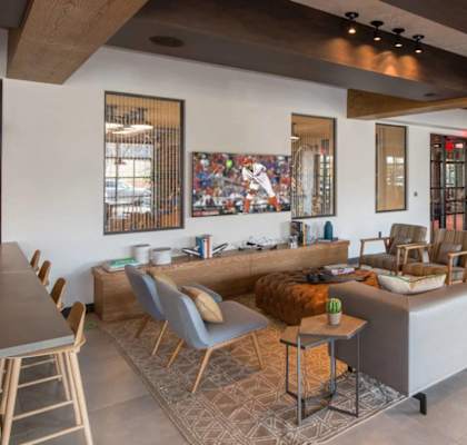 a living room with a couch and chairs and a table at Reed Row, Washington