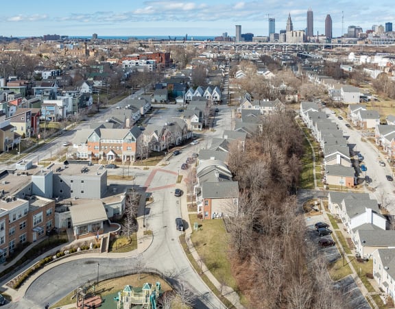 a row of apartment homes on a city street
