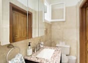 Thumbnail 21 of 26 - Powder Room - Upstairs