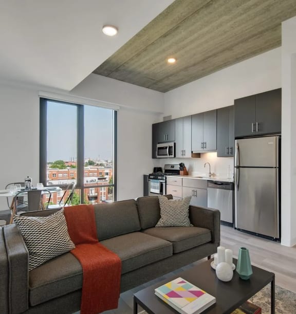 a living room with a couch and a table