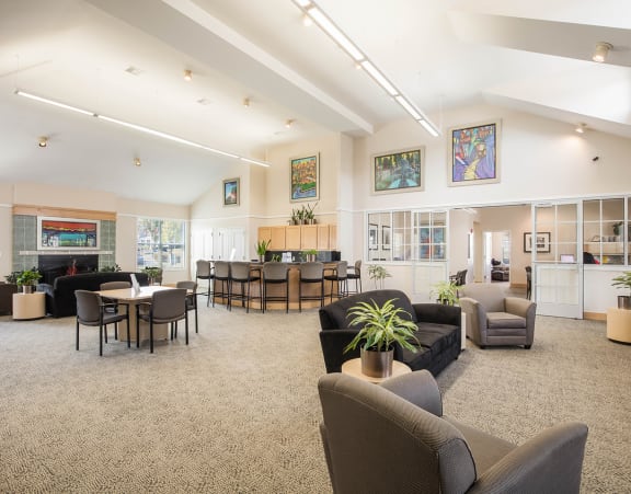 the lobby of a building with a fireplace