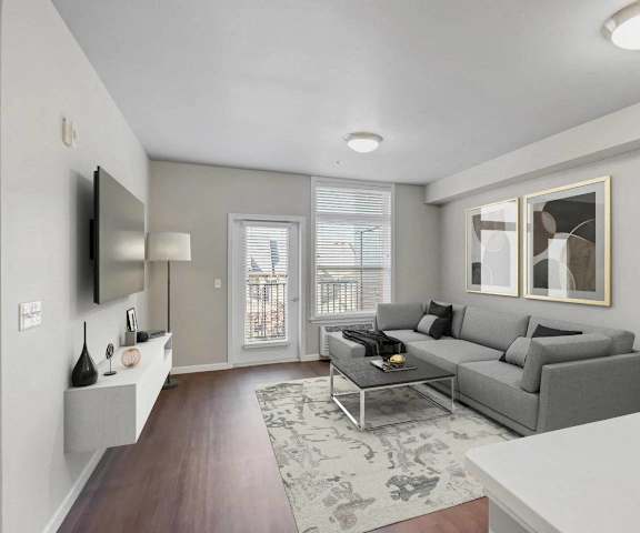 a living room with a couch and a table