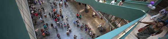 a crowd of people in a lobby of a building f people in a lobby of a building at Parcels at Concourse, Memphis, Tennessee