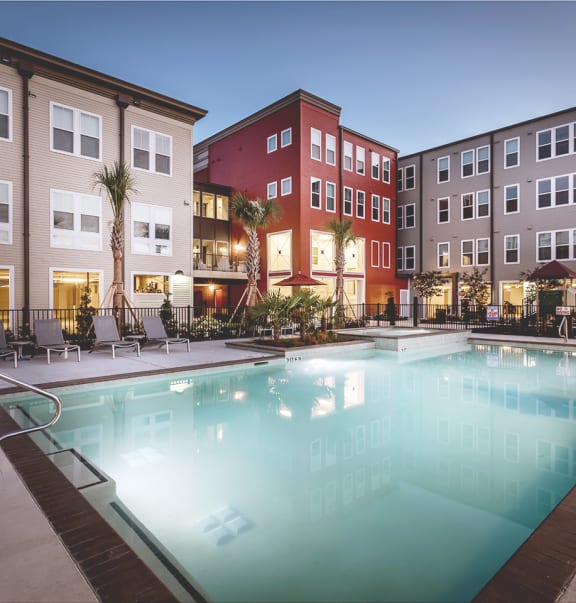 The swimming pool at Villas on the Strand apartments in Galveston, TX